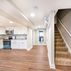 Basement Remodeling - LVT With Kitchenette and White Interior