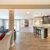 Basement remodel with a cozy family room and wet bar, Kensington, MD