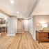 Basement remodel with a cozy family room and wet bar, Kensington, MD