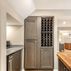 Basement remodel with a cozy family room and wet bar, Kensington, MD