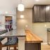 Basement remodel with a cozy family room and wet bar, Kensington, MD