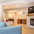 Basement remodel with a cozy family room and wet bar, Kensington, MD