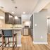 Basement remodel with a cozy family room and wet bar