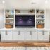 Welcoming basement finishing with beautiful built-ins and small wet-bar, Sykesville, MD 