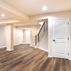 Stylish Basement Renovation with Custom Bar and Designer Bathroom